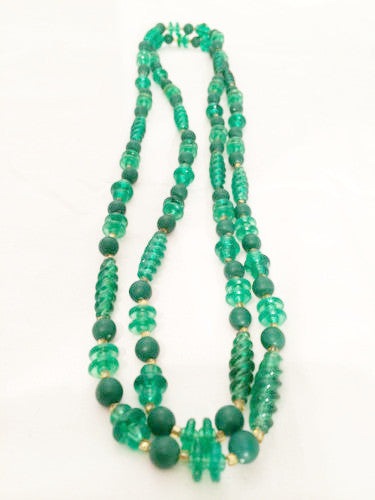 Art Deco Flapper Necklace: Translucent Green Elegance from the Roaring Twenties