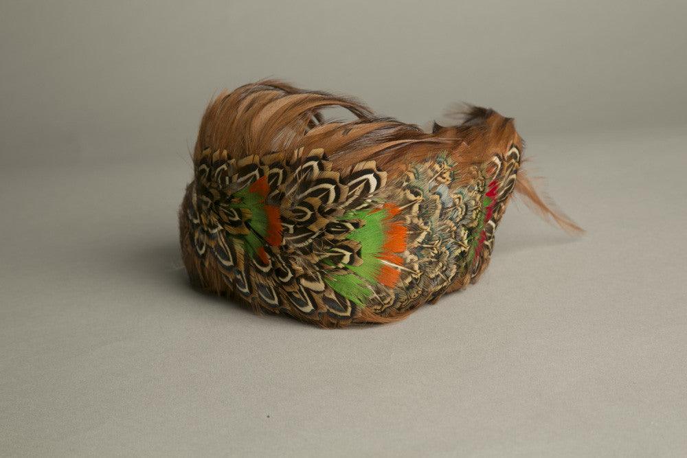Vintage feathered toque hat in orange, green, and brown tones, handmade fascinator from the 1970s, genuine bird feathers.