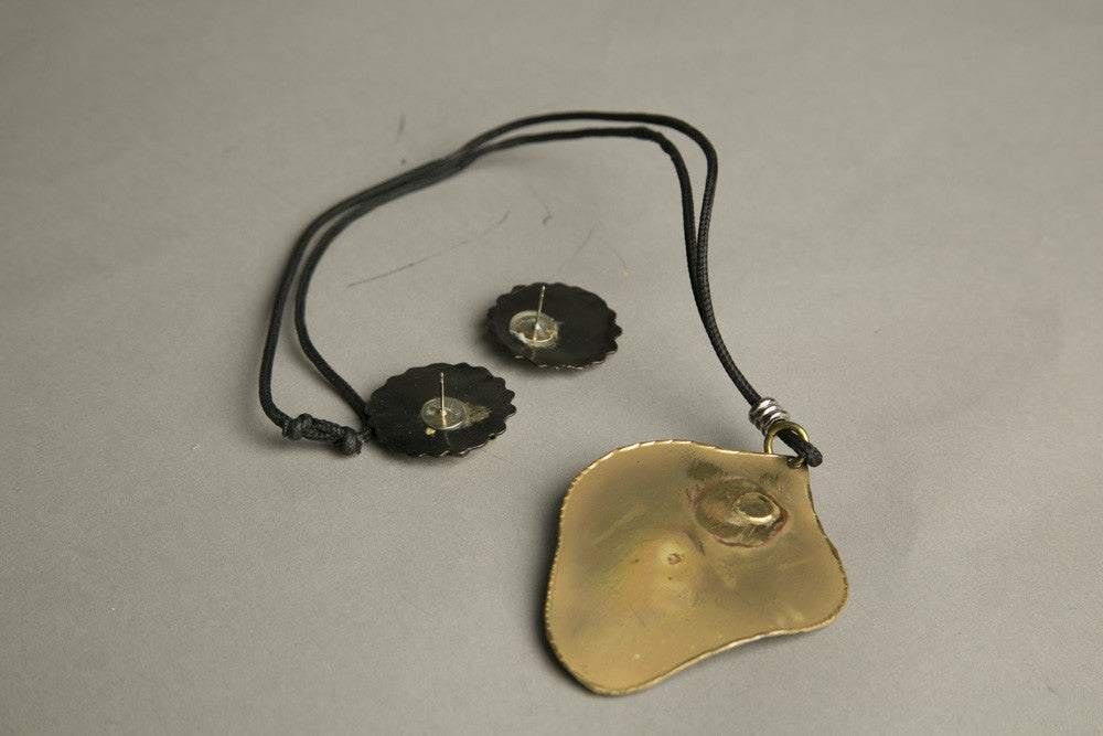 Handcrafted wild elephant jewelry set with necklace and earrings from Ohio Art Fair.