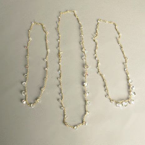 Set of 3 handmade vintage crystal necklaces with golden knit chain, 1980s.