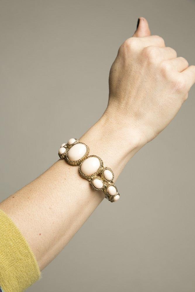 Pastel pink beaded bracelet with gold accents, 1980s vintage costume jewelry.