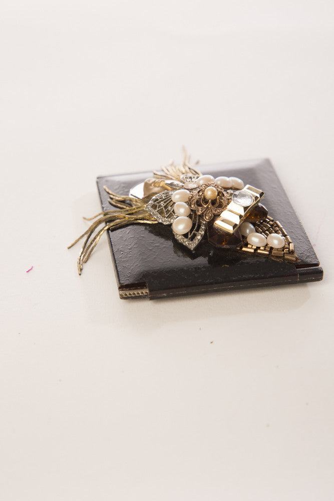 Rare vintage compact mirror with 3D golden and silver beaded details, featuring pearls, 3 inches wide.