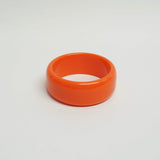 VINTAGE PLASTIC JEWELRY ORANGE BANGLE