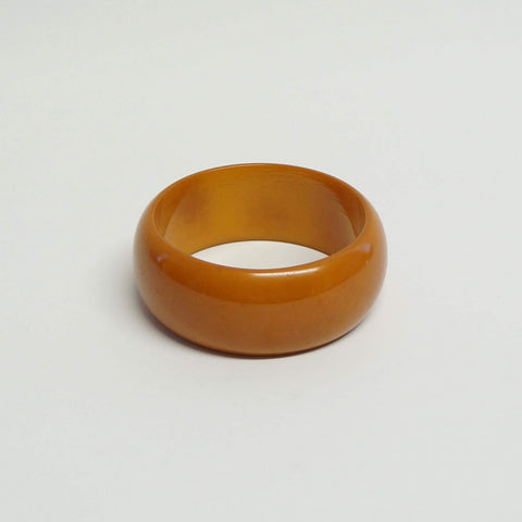 Apple Cider Bakelite Bangle: Vintage Elegance in Plastic Jewelry