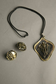 Handcrafted wild elephant jewelry set with necklace and earrings, artisanal design from Ohio Art Fair.
