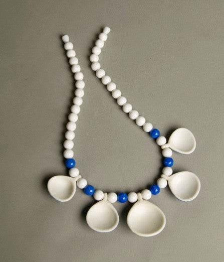 Vintage Avon necklace with figural sea shells and plastic beads, circa 1987.