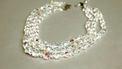 Crystal Vintage Jewelry Aurora Borealis beaded necklace with multi-strand faceted clear crystals.