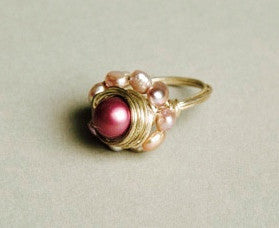 Bold Yet Dainty: Artistic Pearl Cocktail Ring with a Twist