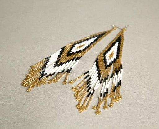 Shoulder duster earrings with handmade beaded vintage design in golden, silver-dark grey, and snow white.