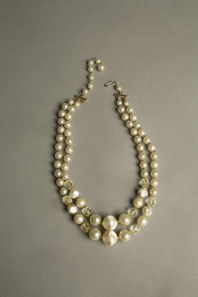 Retro short necklace with multi-strands of pearl-like beads, yellow crystals, and seed bead spacers, vintage 1960s Japan.