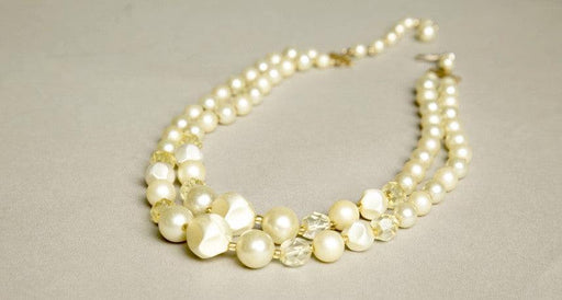 Retro short necklace with two strands of faux pearls, yellow crystals, and seed bead spacers from the 1960s Japan.