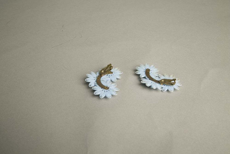 Vintage flower child fabulous clip-on earrings with rhinestone detailing.