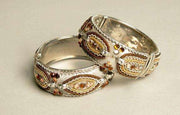 Set of 2 vintage hinged bangles with metallic beading in silver and gold tones.