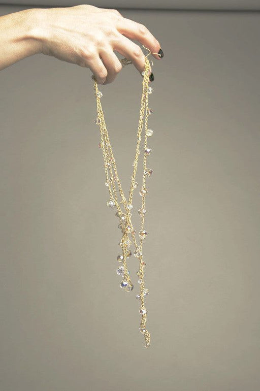 Set of 3 vintage crystal necklaces with golden knit chains.