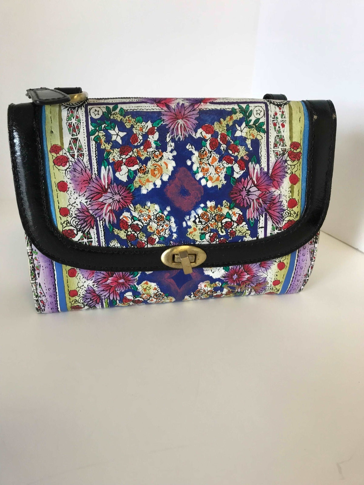 Sharif Designs Hand-Painted Floral Leather Handbag: A Fusion of Artistry and Functionality