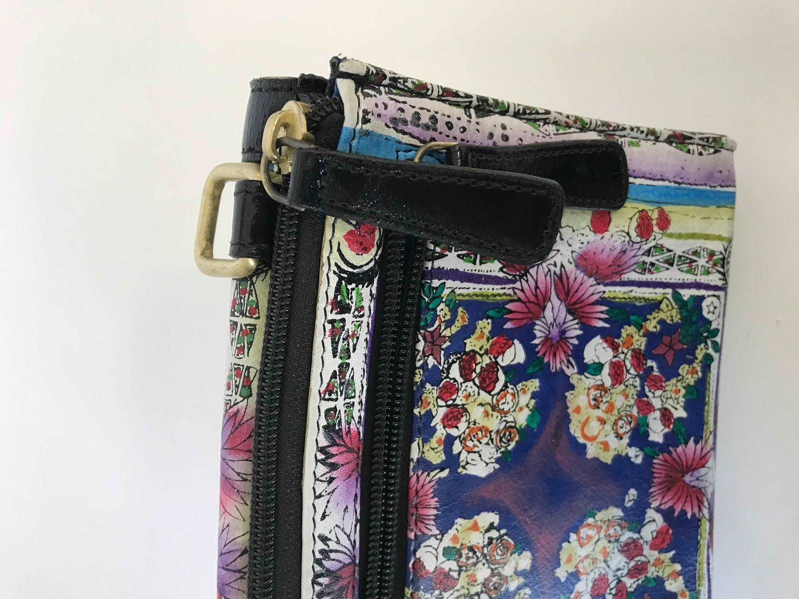 Sharif Designs Hand-Painted Floral Leather Handbag: A Fusion of Artistry and Functionality