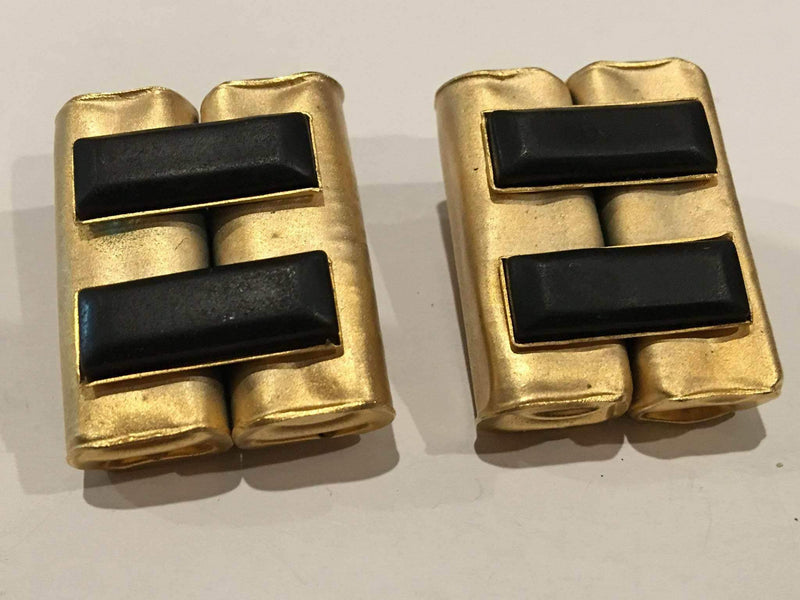Modernist clip-on earrings in brushed gold with black beads, vintage 1980s-90s design.