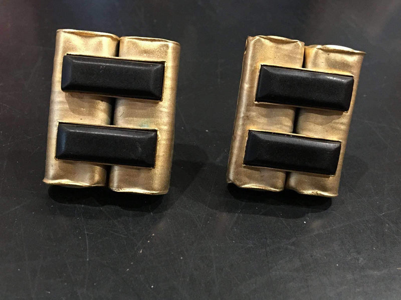Modernist clip on earrings in golden hammered metal with black beads, vintage 1980s-90s.