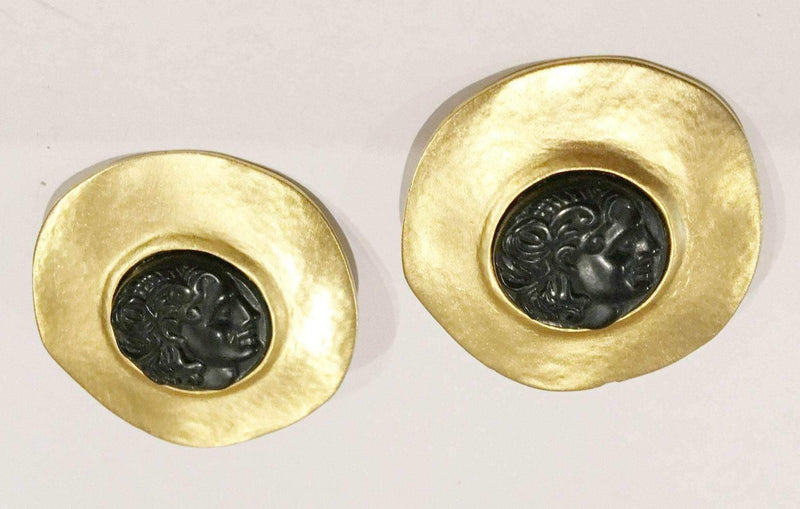Merlusa Hercules Clip on earrings with hammered golden frame and Greek face design.