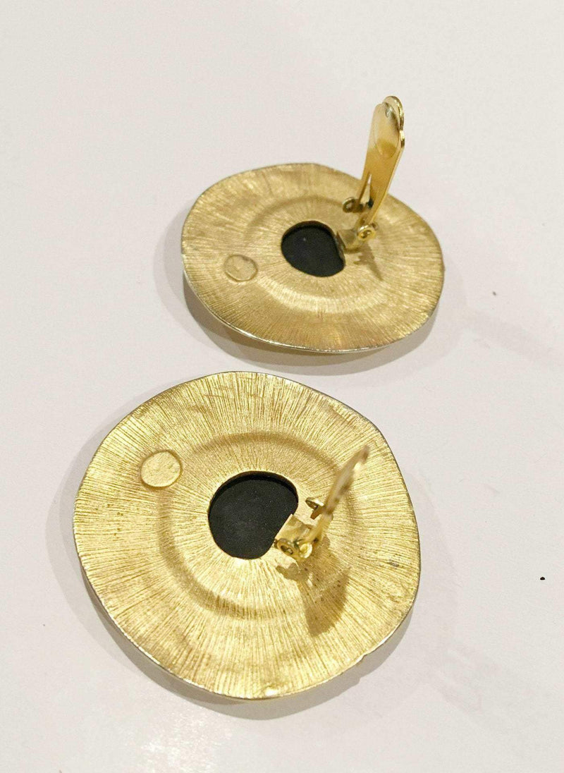 Merlusa Hercules Clip on Earrings with gold modernist hammered frame and Greek face design.