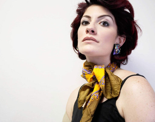 Handmade vintage clip-on earrings in abstract purple, pink, blue, black, and gold design, 1970s.