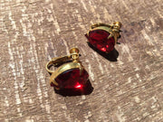 Miriam Haskell vintage red rhinestone earrings with gold settings, rare 20th-century luxury jewelry.