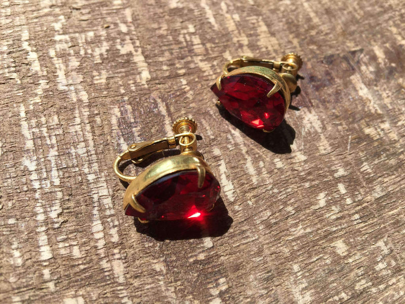 Miriam Haskell vintage red rhinestone earrings with gold settings, rare 20th-century luxury jewelry.
