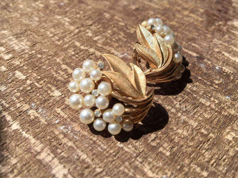 Trifari pearls floral clip-on earrings with rhinestones, vintage costume jewelry.