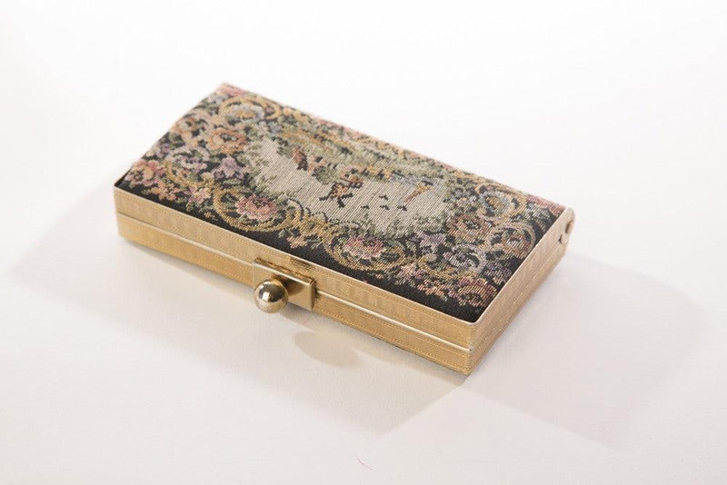 Victorian purse tapestry bag with floral needlepoint and golden clasp.